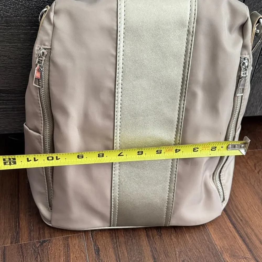Neutral Taupe Woman’s Backpack with Metallic Accent and many zipper pockets. - Picture 12 of 13